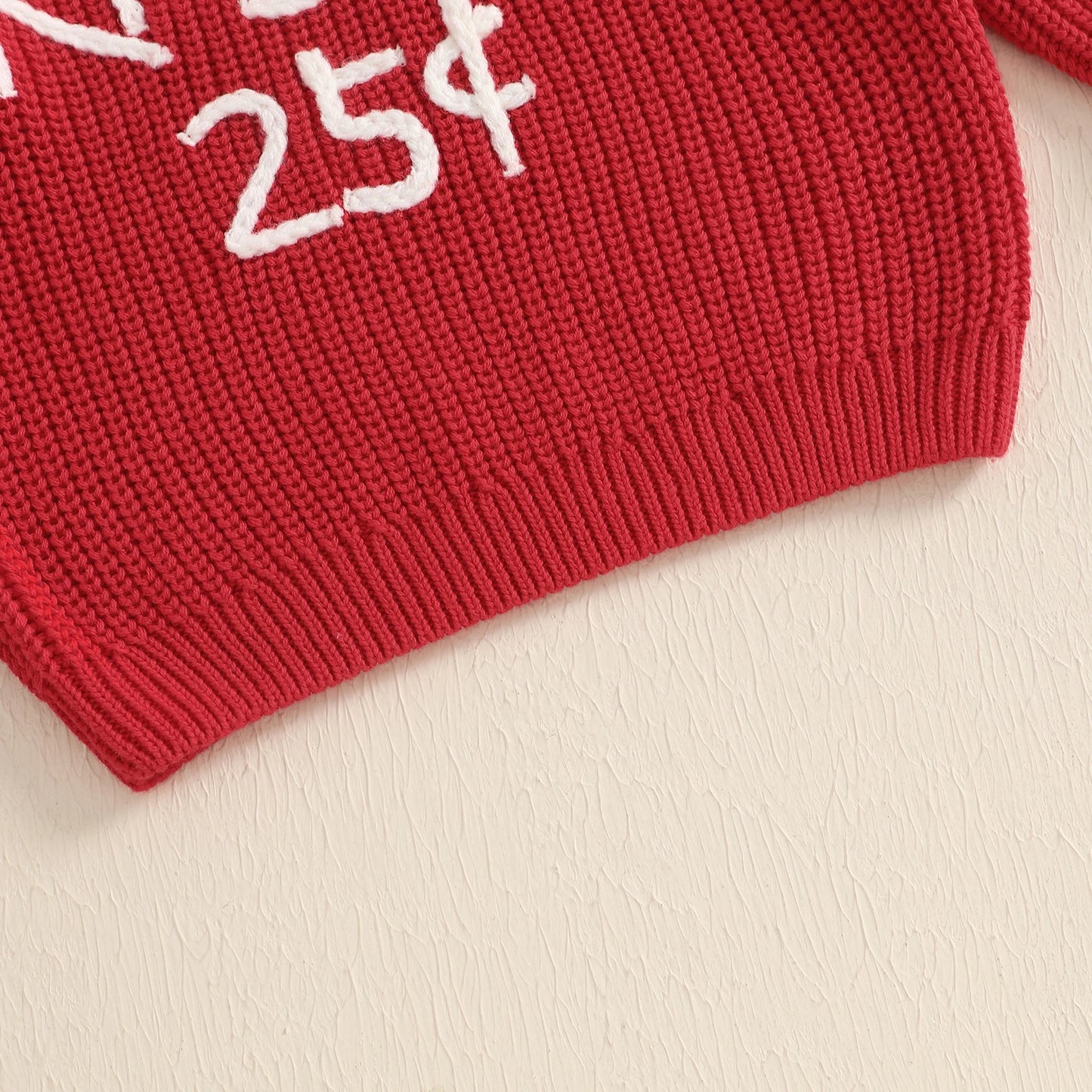 Embroidered 25¢ Kisses Knit Sweater, Unisex