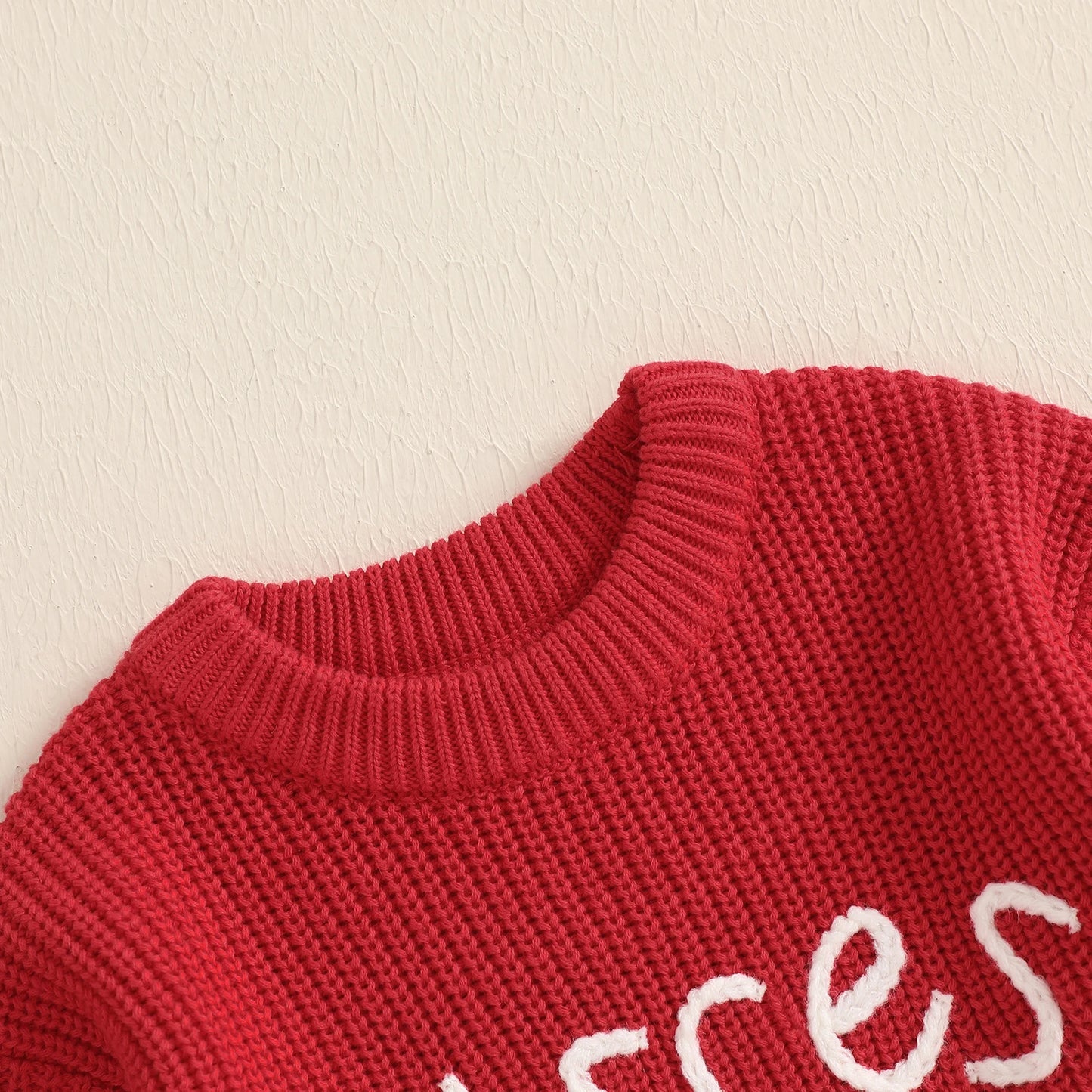 Embroidered 25¢ Kisses Knit Sweater, Unisex